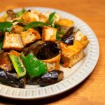 Brown Rice and Black Bean Bell Peppers Baked in Tomato Sauce